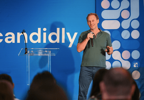 Jonathan speaking on stage